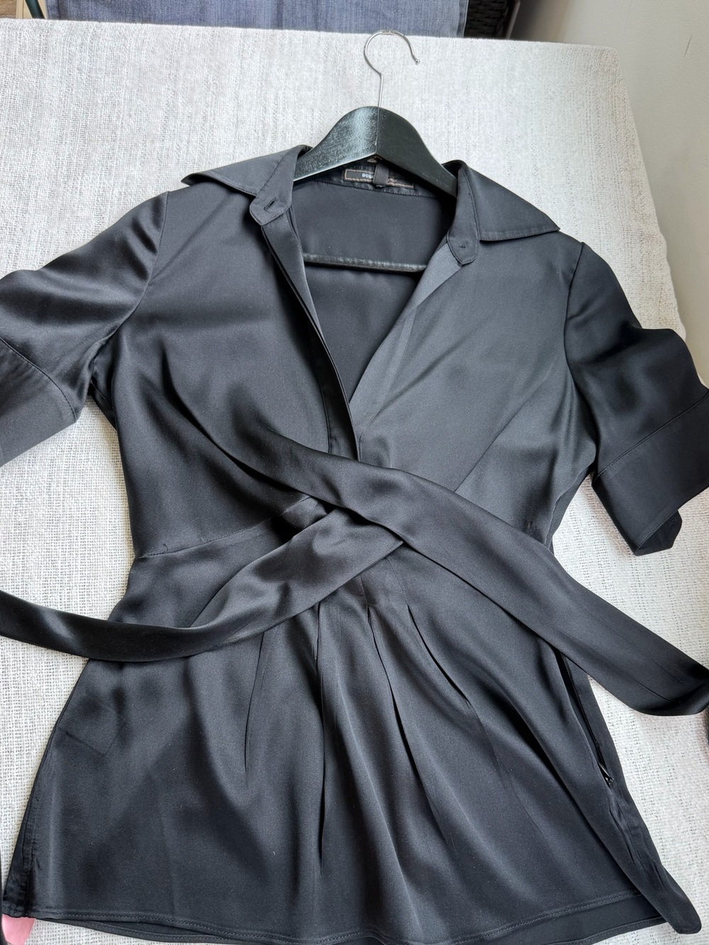 BCBGMaxAzria black v-neck silk/spandex top with wrap tie at waist